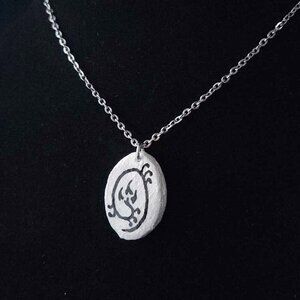 Iridescent Victorian Gothic floral necklace with a small silver chain